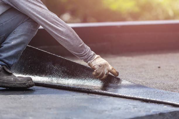 Professional Emergency Waterproofing technician working in Harrison, NY